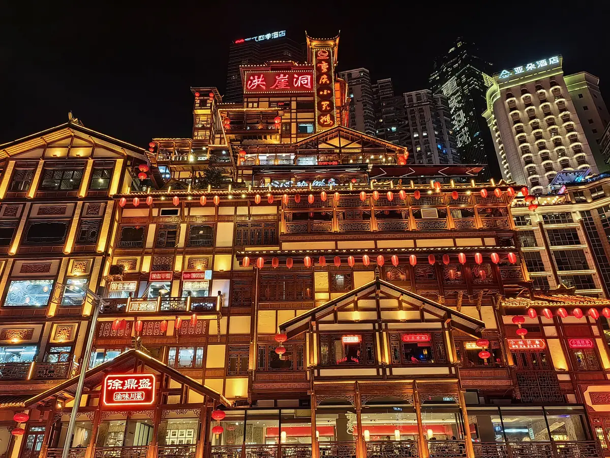 Hongyadong illuminated at night in Chongqing