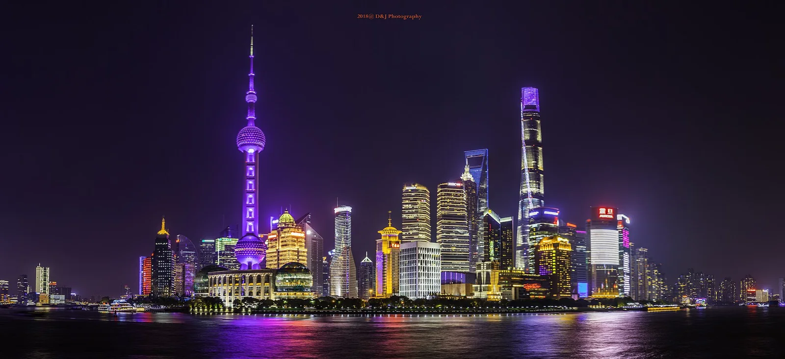 Pudong skyline illuminated at night, viewed from the Bund in Shanghai